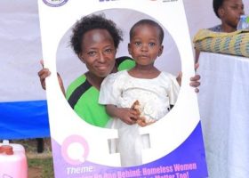 Rehabilitated woman and her daughter share a picture in the photo frame on womens day